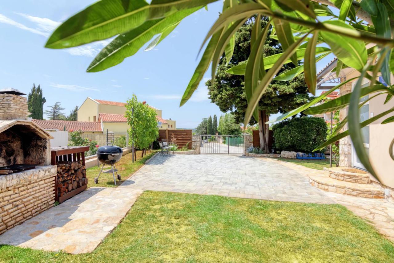 Laurus Garden Ferienhaus *